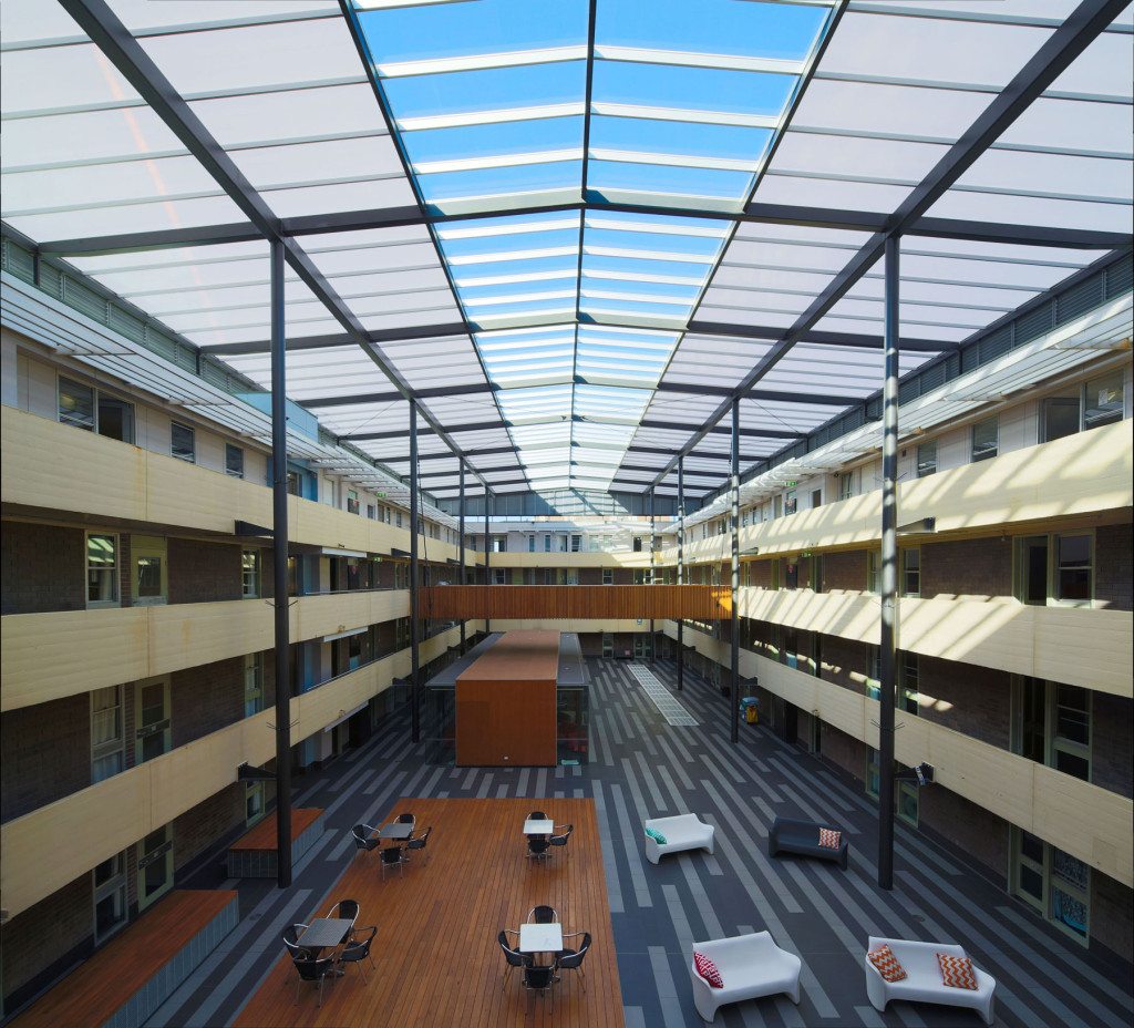 Natural Lighting Building with Commercial Flat Roofing Extensions UNSW New College Kensington, Sydney - refurbishment solved natural lighting Polycarbonate Glazing Energy Health